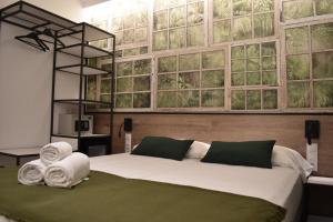 Säng eller sängar i ett rum på Casp Green House