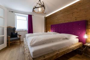 Posteľ alebo postele v izbe v ubytovaní SportRedia Appartements