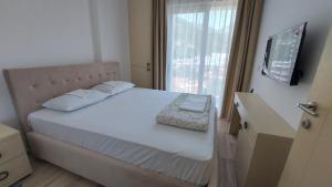 Hotel Kaligrosh客房内的一张或多张床位