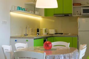 Kuchyň nebo kuchyňský kout v ubytování Apartman Kimi