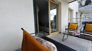 Posedenie v ubytovaní Apartament WILKASY (k. Giżycka)