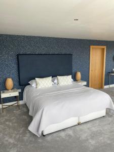 Llit o llits en una habitació de Sea Vista Boutique Accommodation