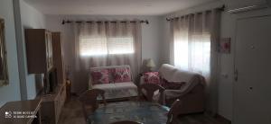A seating area at Apartamento en Las Marinas Vera