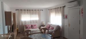 A seating area at Apartamento en Las Marinas Vera