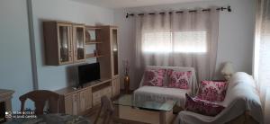 A television and/or entertainment centre at Apartamento en Las Marinas Vera