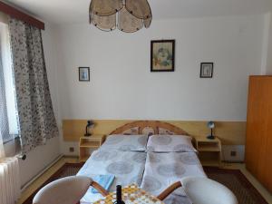 Postel nebo postele na pokoji v ubytování Pension MAAN