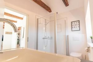 a bathroom with a bath tub and a shower at Ankerplatz in Tönning +85 photos