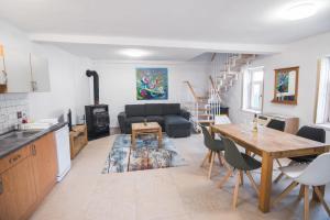 Kuchyň nebo kuchyňský kout v ubytování Natúra Panzió&Apartmanház