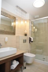 Kylpyhuone majoituspaikassa Hotel Meduza