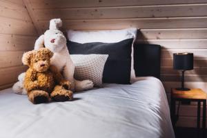 Posteľ alebo postele v izbe v ubytovaní Koncept domki