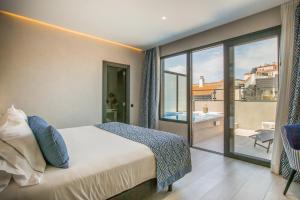 Posteľ alebo postele v izbe v ubytovaní Hotel Brö-Adults Recommended