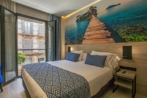 Posteľ alebo postele v izbe v ubytovaní Hotel Brö-Adults Recommended
