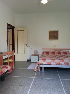 Ένα ή περισσότερα κρεβάτια σε δωμάτιο στο Hotel Mignon Posta