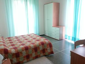 Ένα ή περισσότερα κρεβάτια σε δωμάτιο στο Hotel Mignon Posta