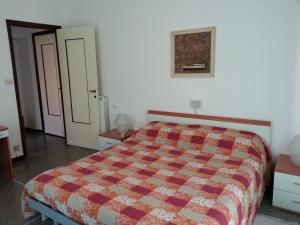 Ένα ή περισσότερα κρεβάτια σε δωμάτιο στο Hotel Mignon Posta