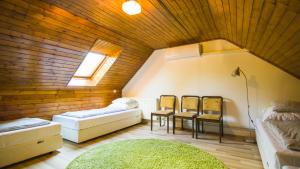Posezení v ubytování Natúra Panzió&Apartmanház