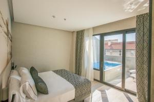 Posteľ alebo postele v izbe v ubytovaní Hotel Brö-Adults Recommended