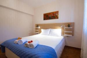Postel nebo postele na pokoji v ubytování Thanasakis apartment, Bogdanatika