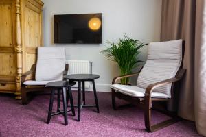 TV a/nebo společenská místnost v ubytování Hotel Marino