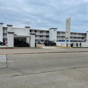 an empty parking lot in front of a hotel at Oceans 2700 in Virginia Beach