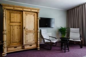 TV a/nebo společenská místnost v ubytování Hotel Marino