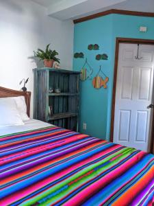 Postel nebo postele na pokoji v ubytování Seaside Inn Roatan