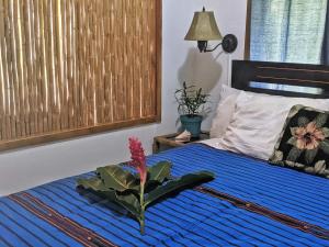 Postel nebo postele na pokoji v ubytování Seaside Inn Roatan