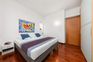 Postel nebo postele na pokoji v ubytování Casa da Suite Impera