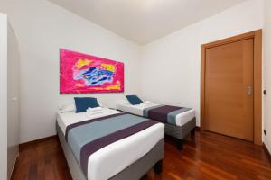 Postel nebo postele na pokoji v ubytování Casa da Suite Impera