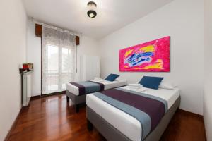 Postel nebo postele na pokoji v ubytování Casa da Suite Impera