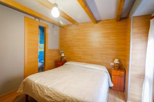 Un pat sau paturi într-o cameră la Albergo Speranza