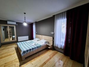 Letto o letti in una camera di Varga Kvareli