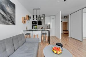 Kuchyňa alebo kuchynka v ubytovaní Apartament Wilcza Gdańsk TriApart