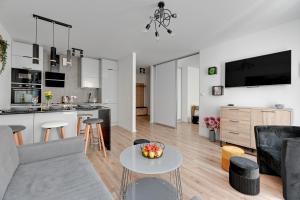 Kuchyňa alebo kuchynka v ubytovaní Apartament Wilcza Gdańsk TriApart