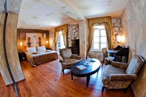 Katil atau katil-katil dalam bilik di Boutique Hotel Astoria