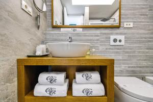 Kúpeľňa v ubytovaní Windrose Design Apartments + 37 fotografií