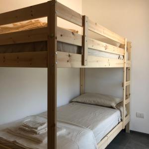 a bedroom with two bunk beds in a room at Casa Giorgia Monopoli in Monopoli