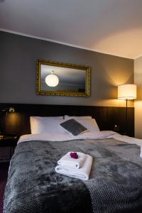 Postel nebo postele na pokoji v ubytování Hotel Marino