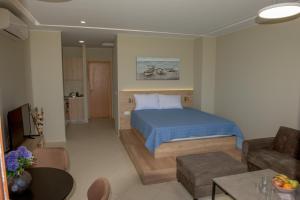 Postel nebo postele na pokoji v ubytování Rafaela Apartments