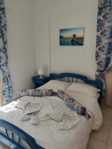 Ένα ή περισσότερα κρεβάτια σε δωμάτιο στο Aiantas