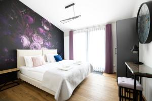 Łóżko lub łóżka w pokoju w obiekcie Aparthotel Inspire Miodova Residence