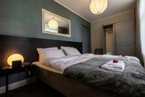 Postel nebo postele na pokoji v ubytování Hotel Marino