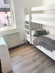 Postel nebo postele na pokoji v ubytování Ferienwohnung Holstenstern