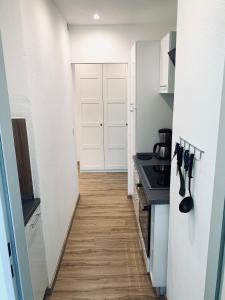 Kuchyň nebo kuchyňský kout v ubytování Ferienwohnung Holstenstern + 2 fotografie