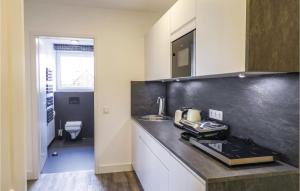 a kitchen with a counter top and a sink at 1 Bedroom Cozy Apartment In Kappeln in Kappeln