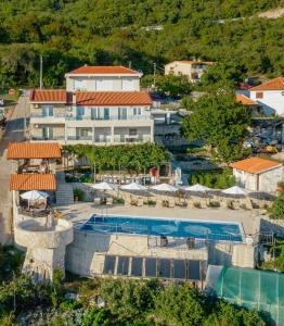 an aerial view of a resort with a swimming pool at Villa Marija **** with private pool in Budva