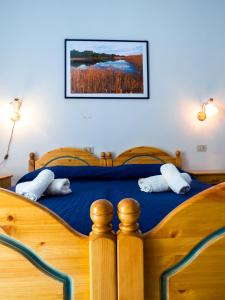 Postel nebo postele na pokoji v ubytování Casa Vittorio B&b