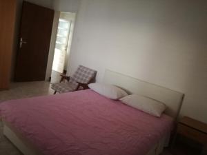 Postel nebo postele na pokoji v ubytování Apartman Laus