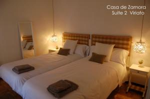 A bed or beds in a room at La Casa de Zamora
