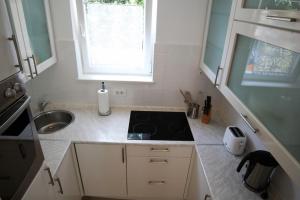 Kuchyňa alebo kuchynka v ubytovaní Guesthouse Rovinj (4285) + 27 fotografií